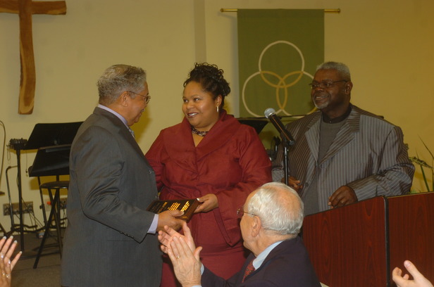 Joseph Butler receiving 2010 Walter Welsh Award from his daughter